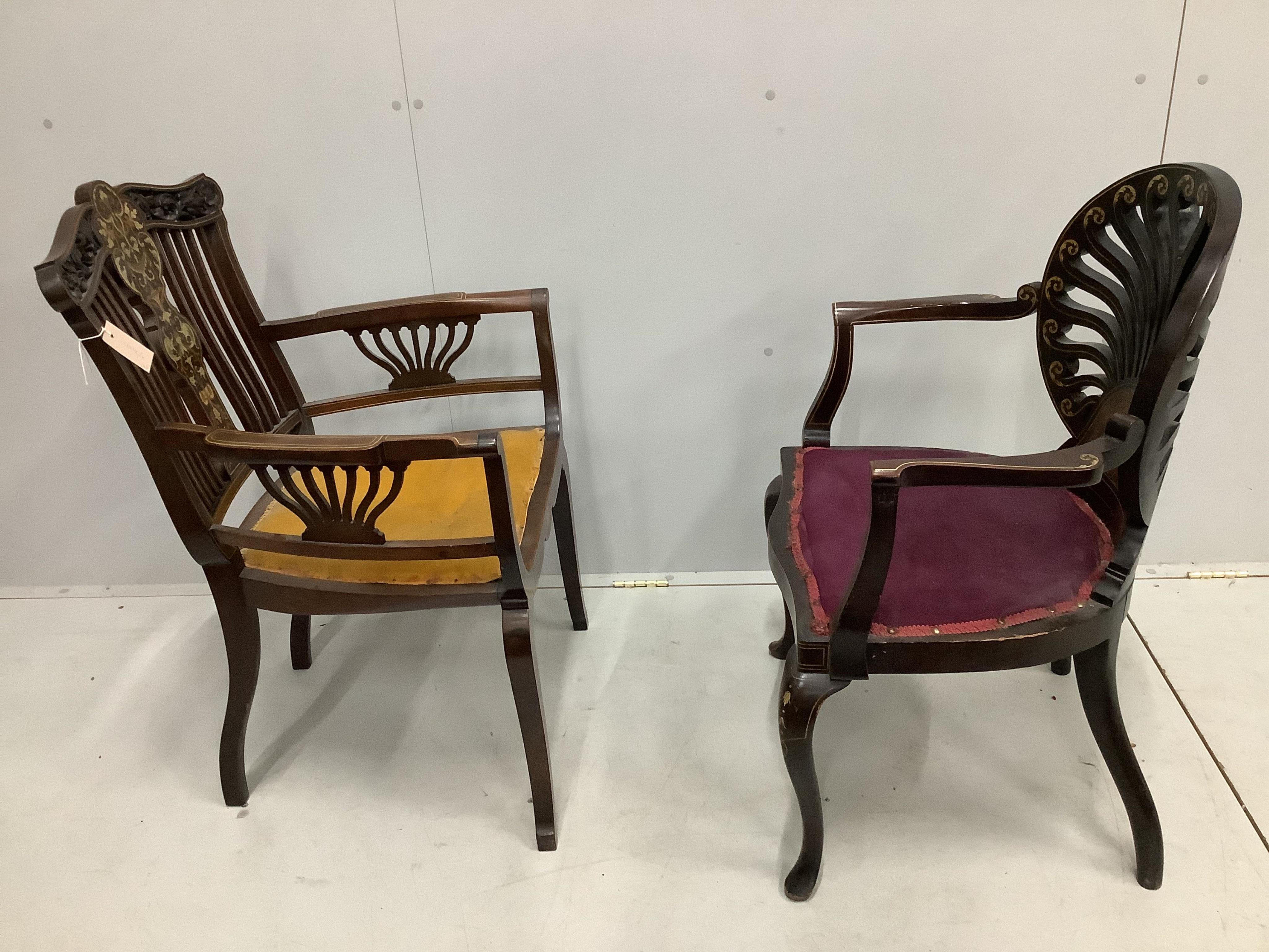 Two Edwardian inlaid mahogany elbow chairs, larger width 58cm, height 92cm. Condition - fair